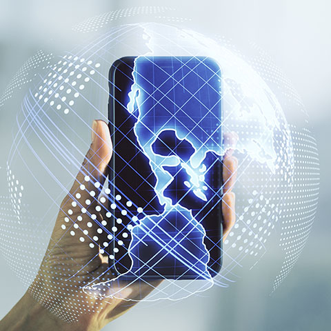 Two people using social media on a smartphone.